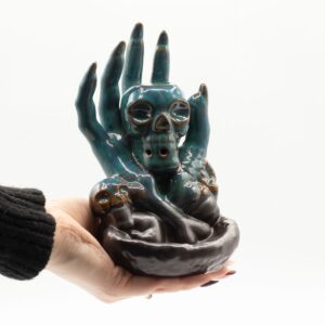 Quemador de incienso de flujo inverso - Calavera en la mano